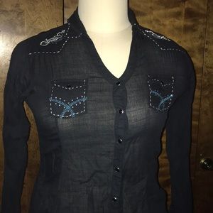 Western Blouse full of detail. Only worn once.
